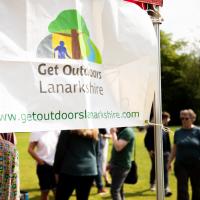 White flag is shown reading 'Get outdoors Lanarkshire' 