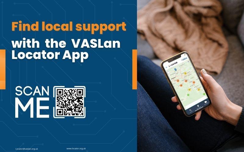 Hand holding a phone that shows a map and is titled "Locator". Picture showing the VASLan Locator App. 